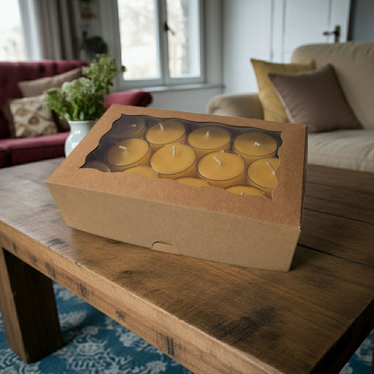 Box of candles on a wooden table in a living room setting