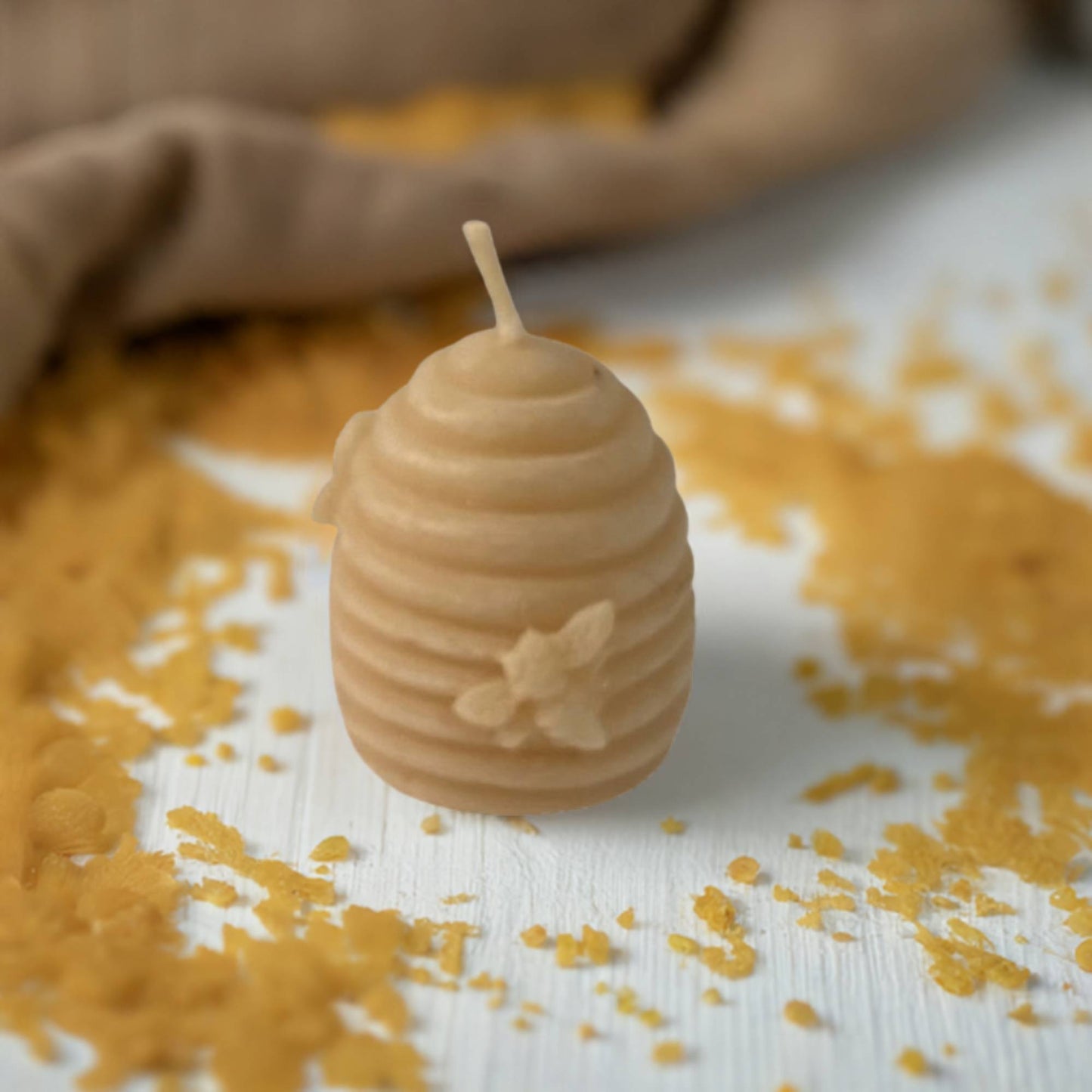 Small handmade beeswax candle beehive design