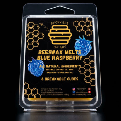 Packaging of Sticky Bee Apiary Beeswax Melts in Blue Raspberry flavor on a black background.