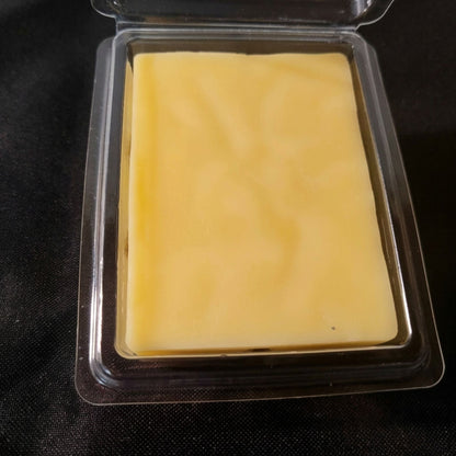 A open package of watermelon scented beeswax melts from sticky bee apiary.
