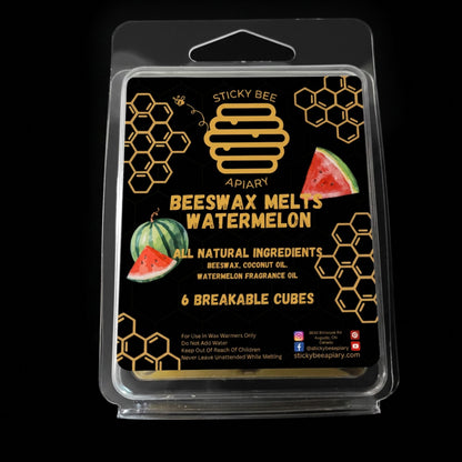 Packaging of Sticky Bee Apiary watermelon scented beeswax melts with watermelon illustrations on a black background.