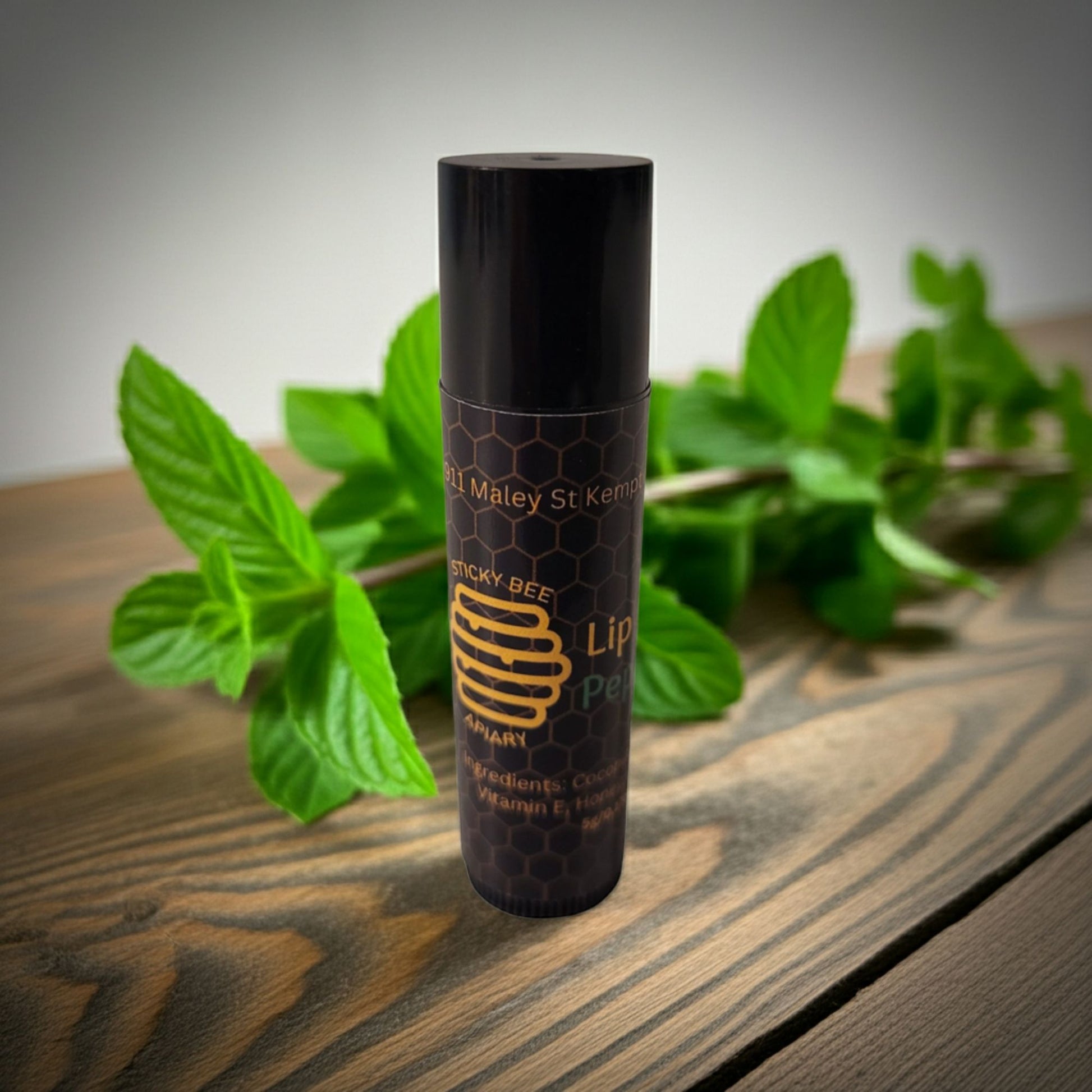Small batch peppermint beeswax lip balm handcrafted in Canada by Sticky Bee Apiary