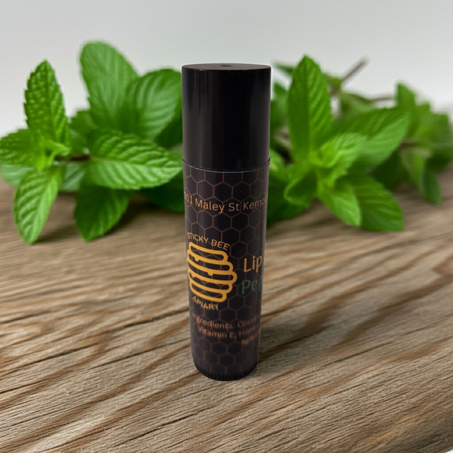 Handcrafted peppermint beeswax lip balm by Sticky Bee Apiary, small batch and all-natural
