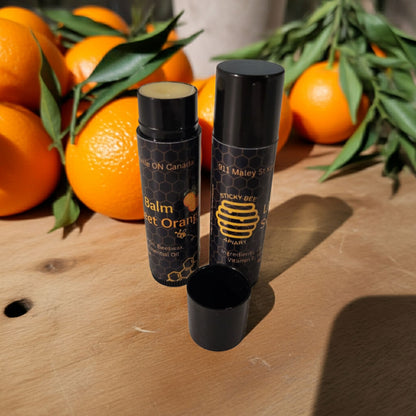 Eco-friendly sweet orange lip balm made in Canada with pure beeswax and natural ingredients